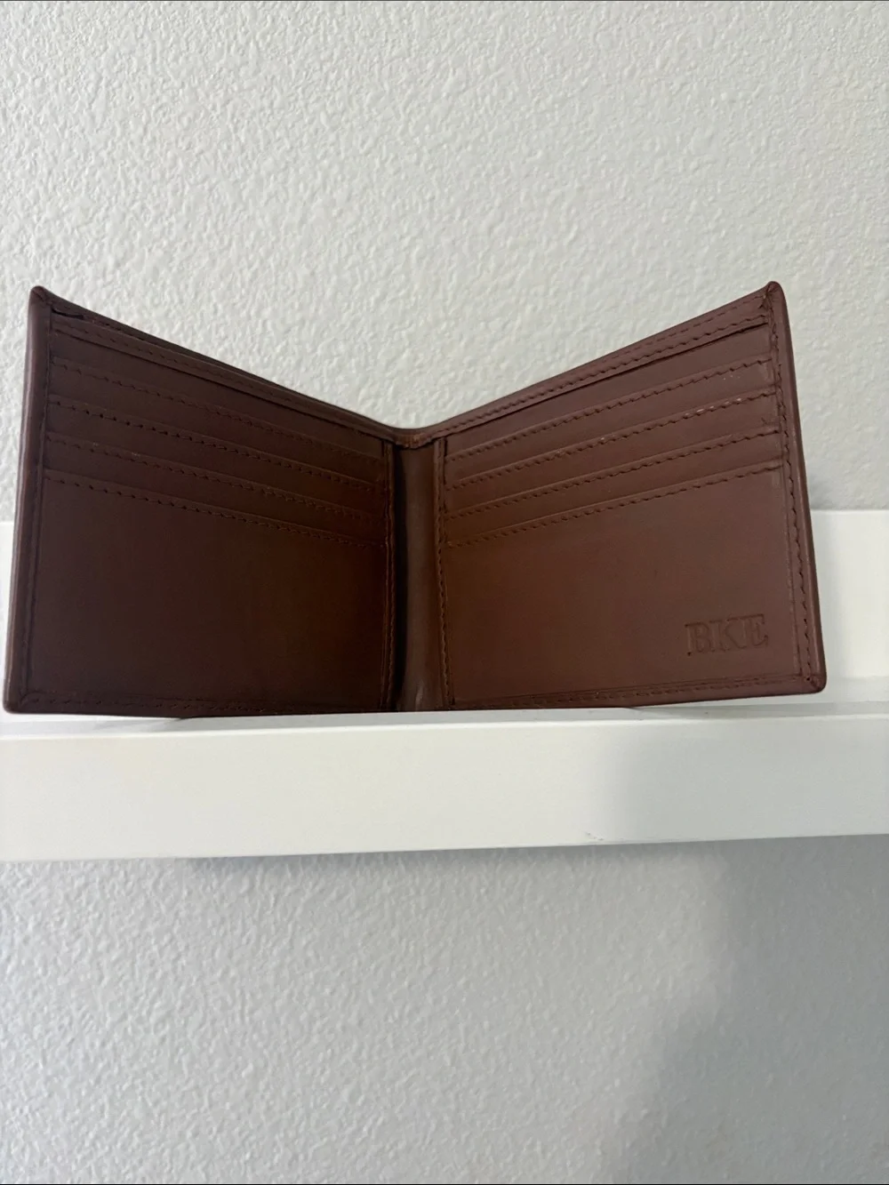 BKE Brown Leather Bifold Wallet with Embossed Flag